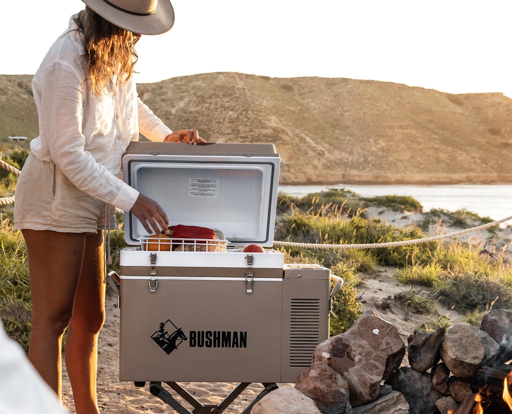 Front view of Bushman Fridge 35-52L on beach